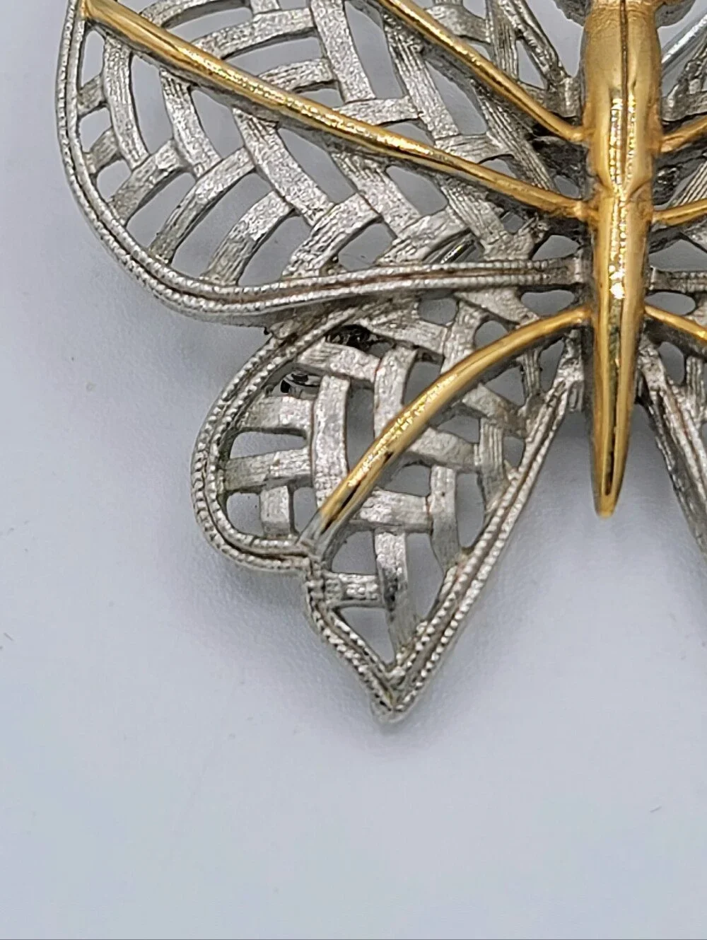 Avon Butterfly Brooch Two Tone Gold Silver Openwork Blue Rhinestone Eyes Vintage